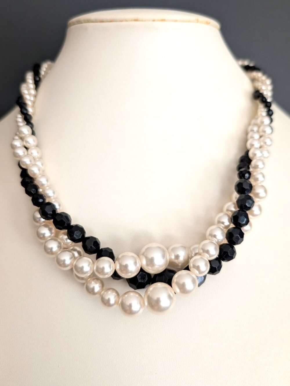 Twisted creamy white and black beaded necklace